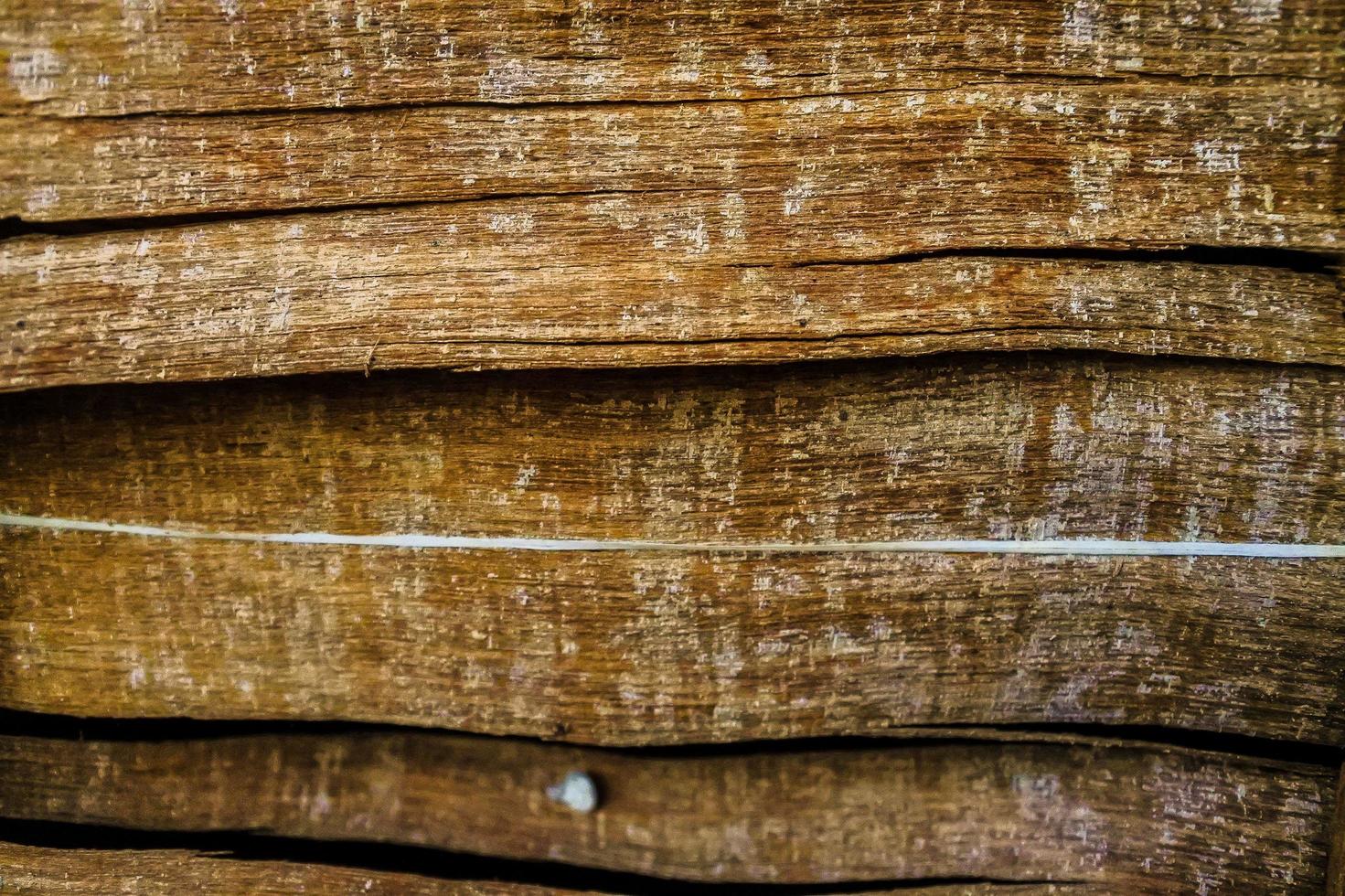 Fondo de textura de tablón marrón de madera oscura foto