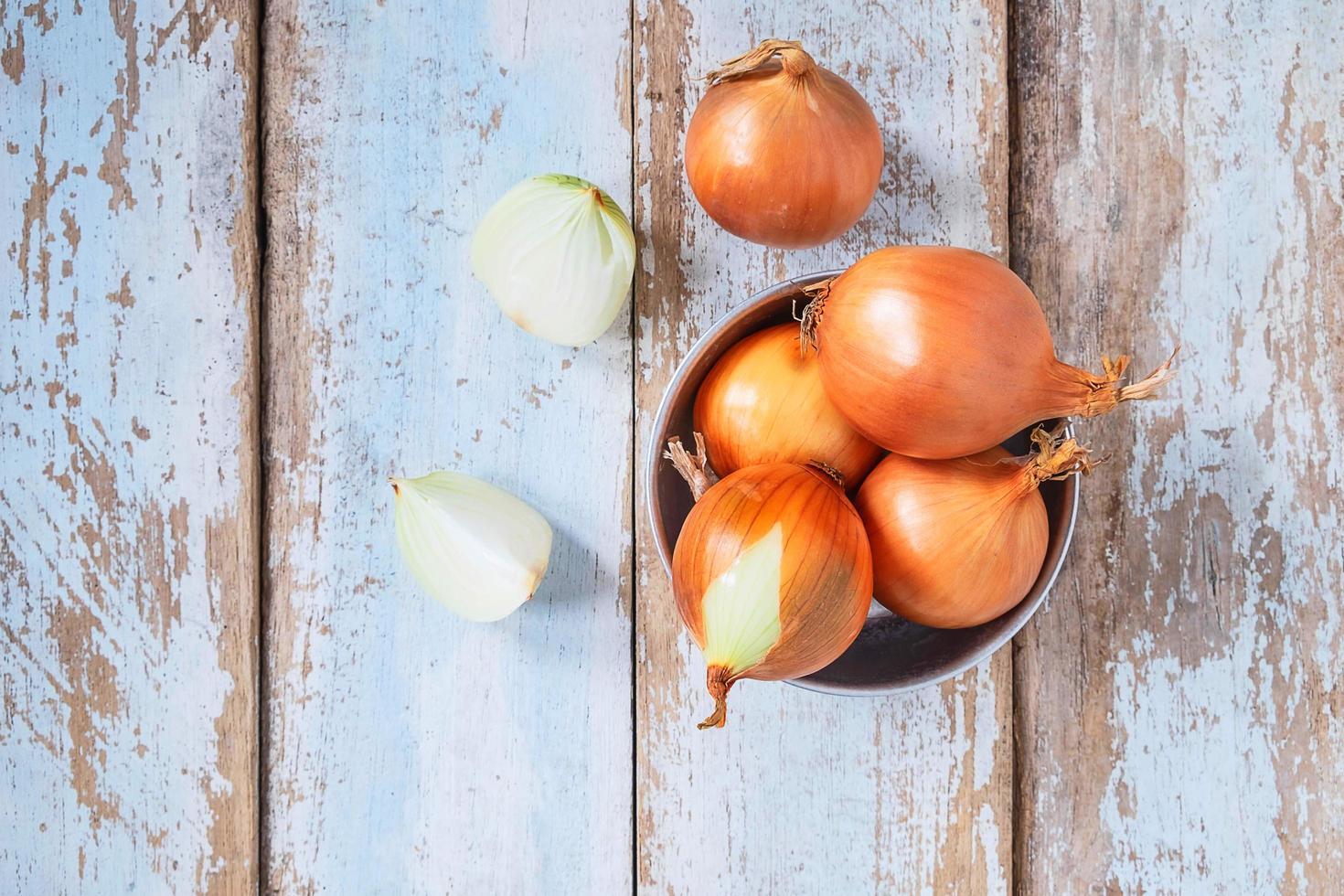 Whole and chopped onions photo