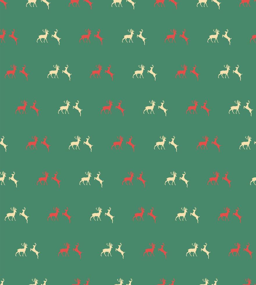 Seamless pattern with Christmas reindeers on green background vector