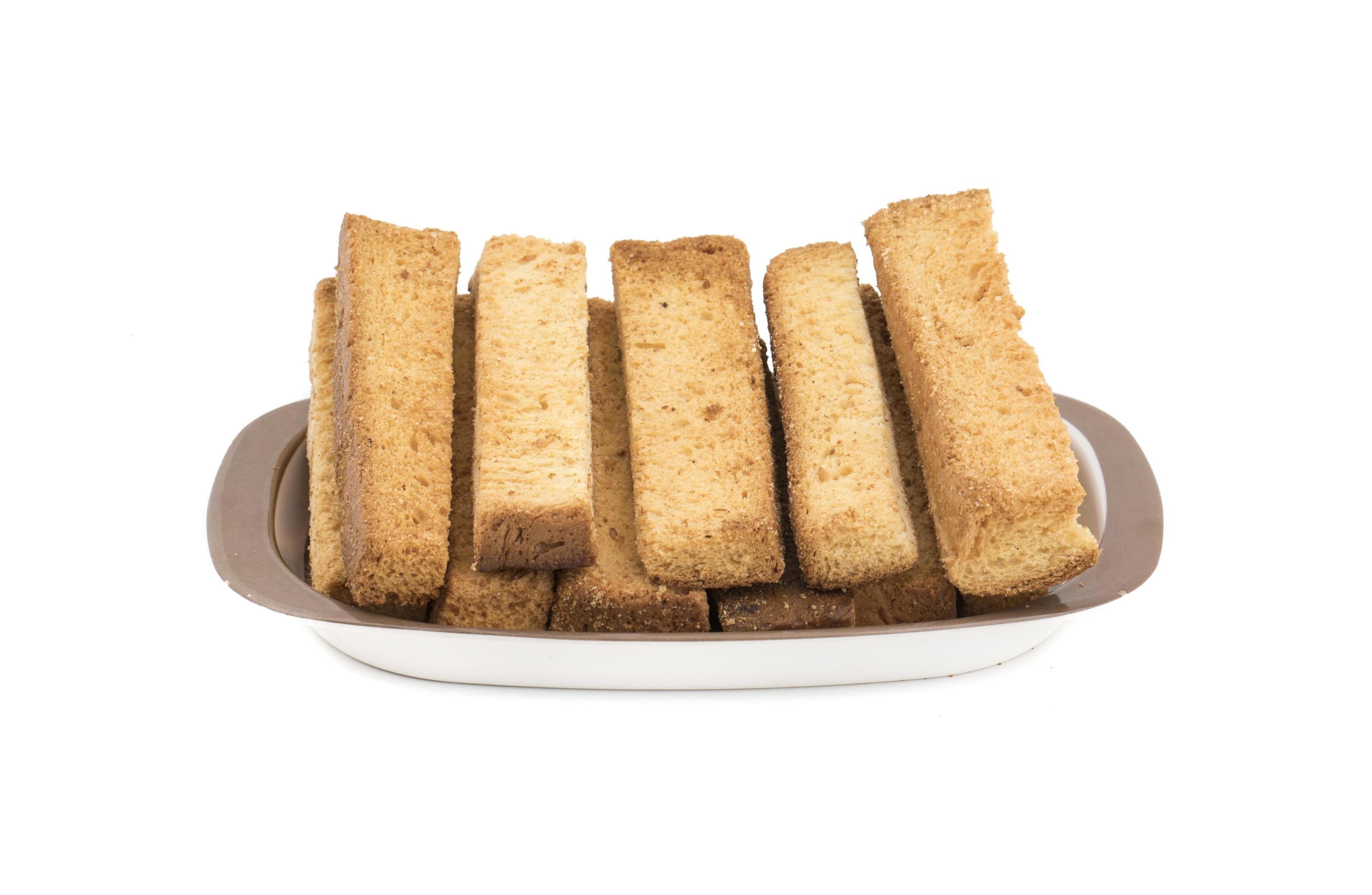 Dry toast sticks on a platter 1544340 Stock Photo at Vecteezy