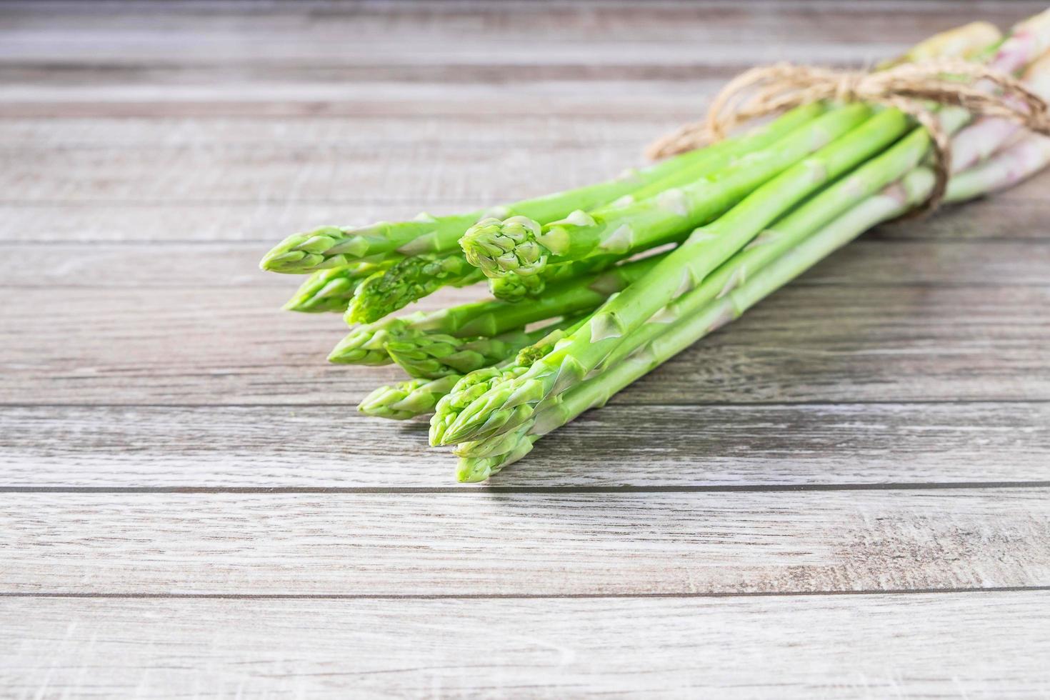 Fresh asparagus heads photo