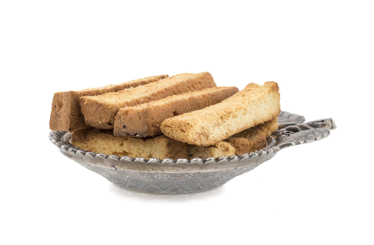 Toast sticks in a silver bowl photo