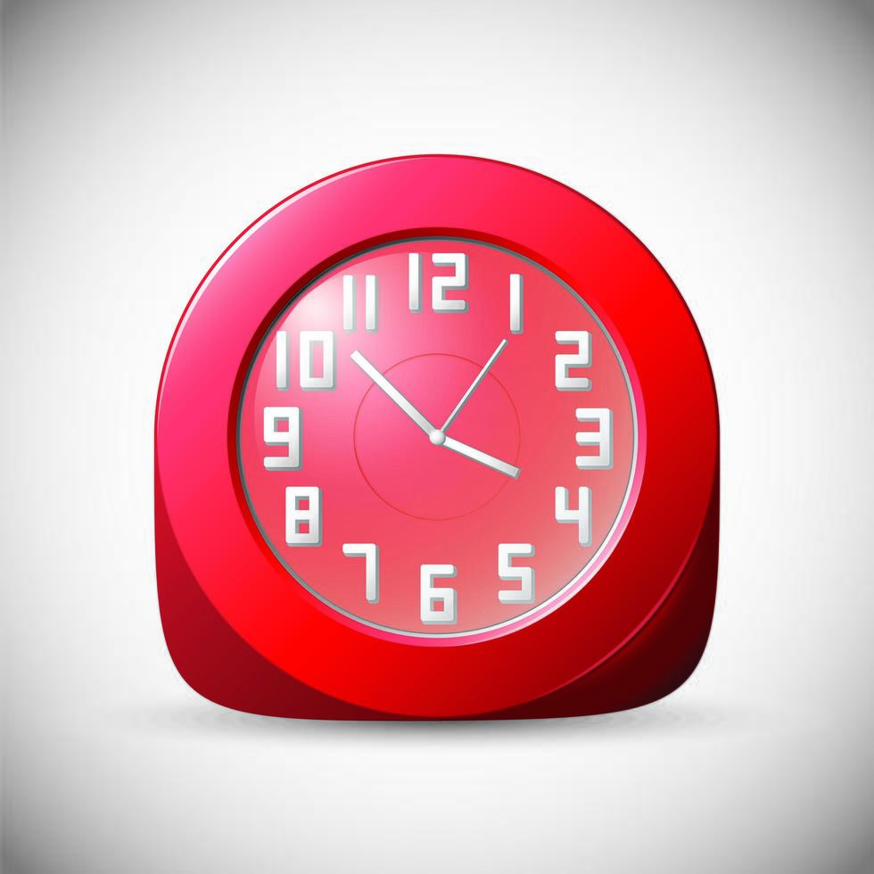 Reloj rojo con números blancos sobre fondo gris vector