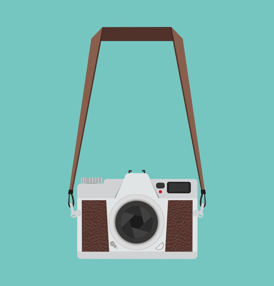 Flat style vintage camera hanging on a green background vector