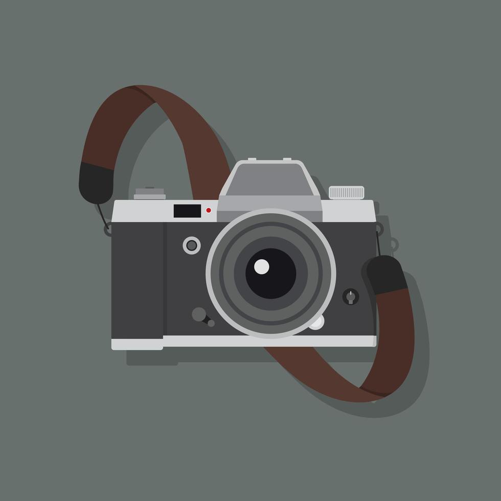 Retro camera in a flat style with strap vector