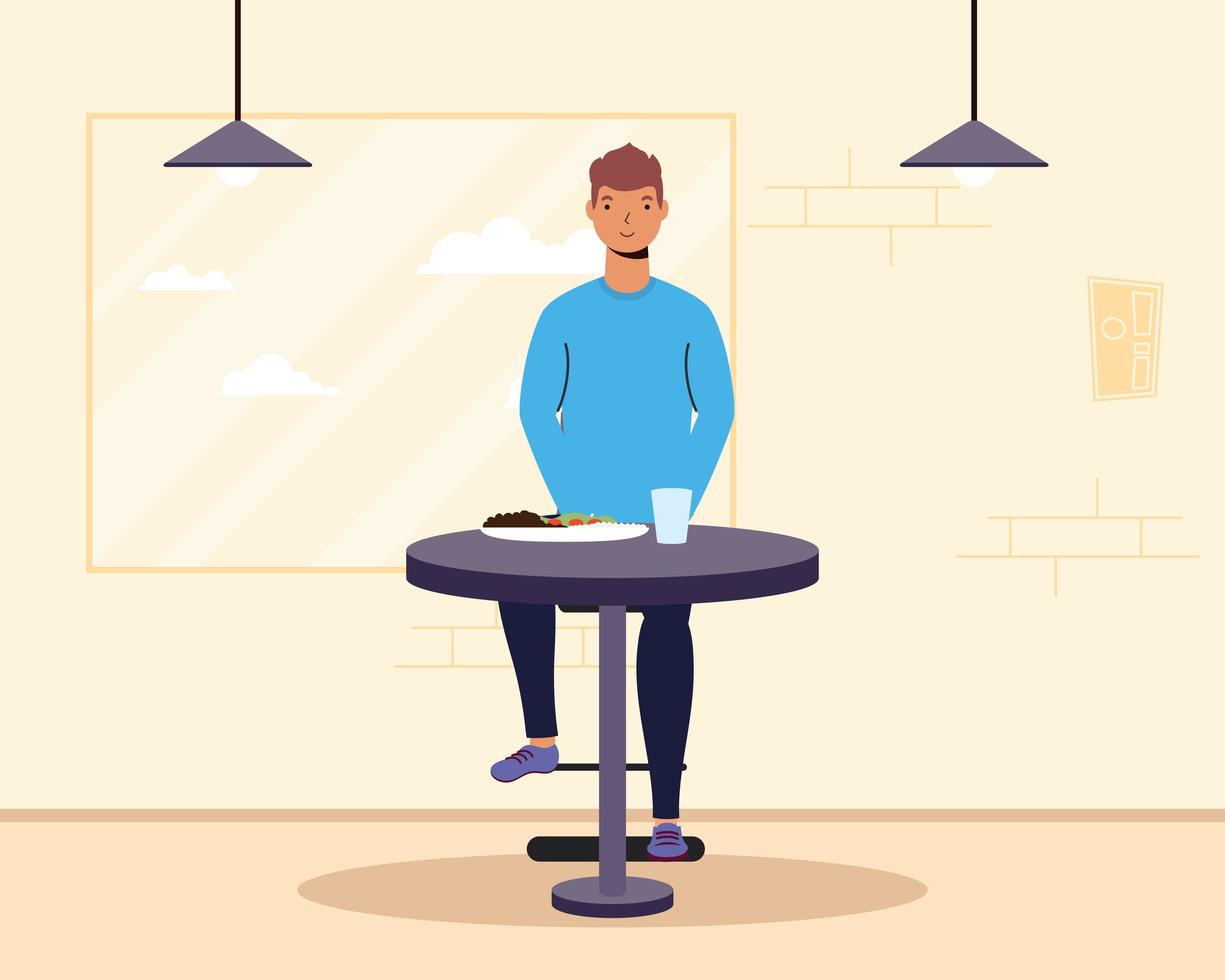 Young man seated in a restaurant vector