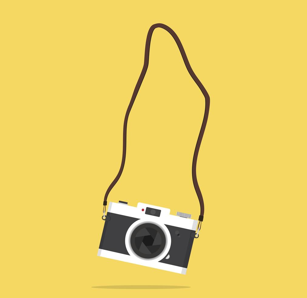 cámara de fotografía vintage con correa vector