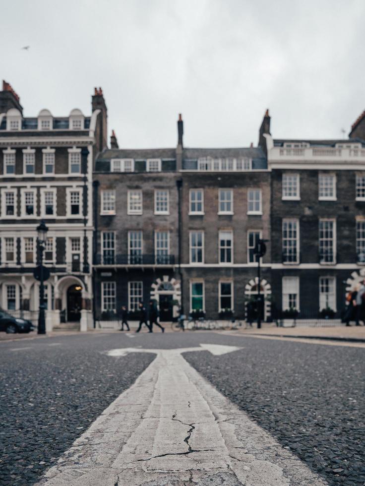 Arrows pointing both ways in the street photo