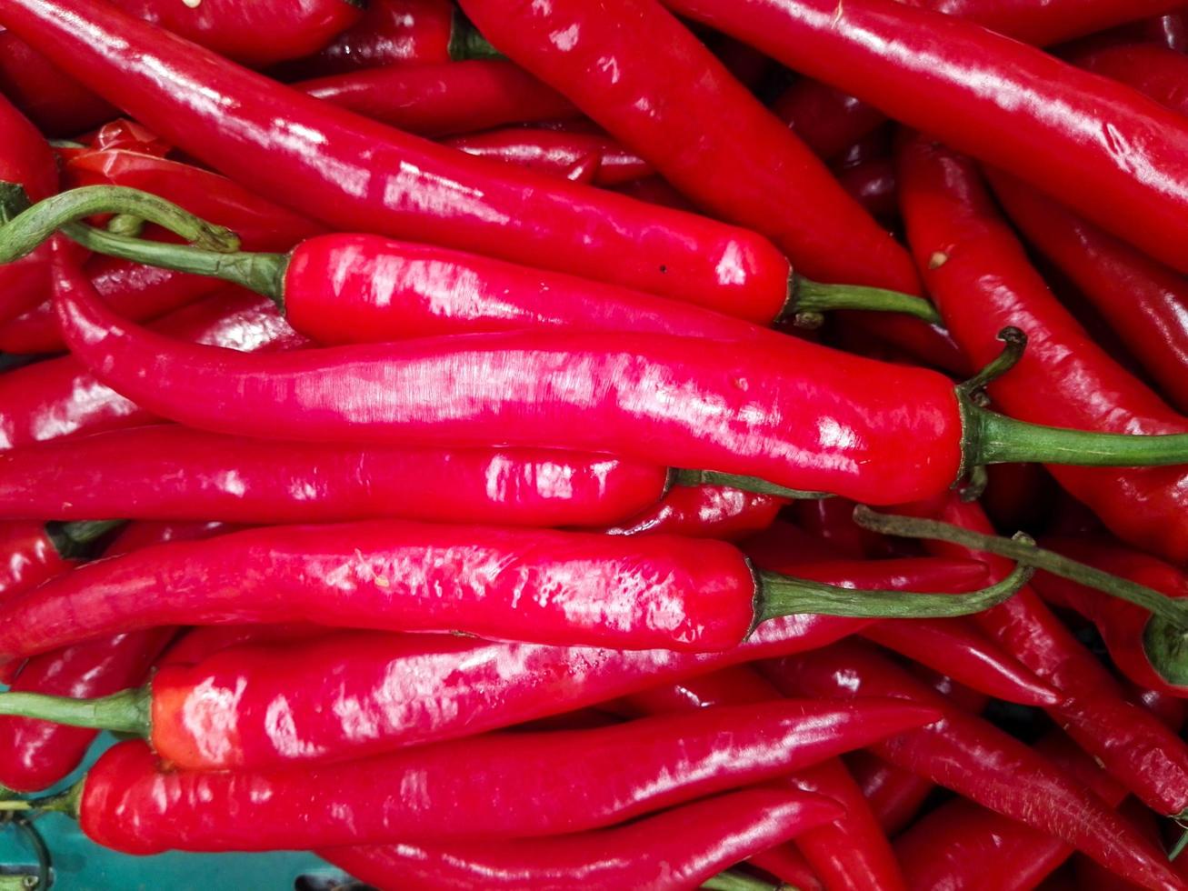 Close-up of fresh red peppers photo