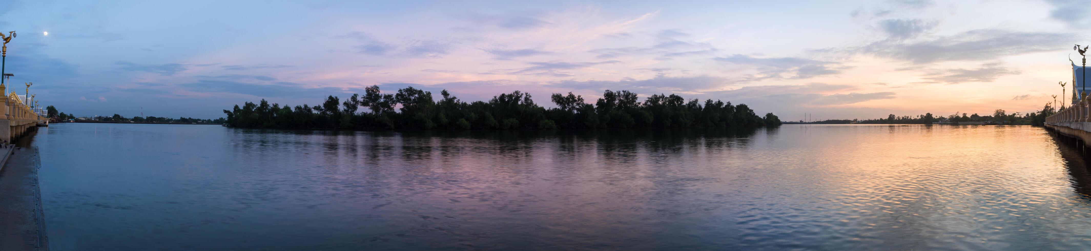 Island with trees at sunset photo