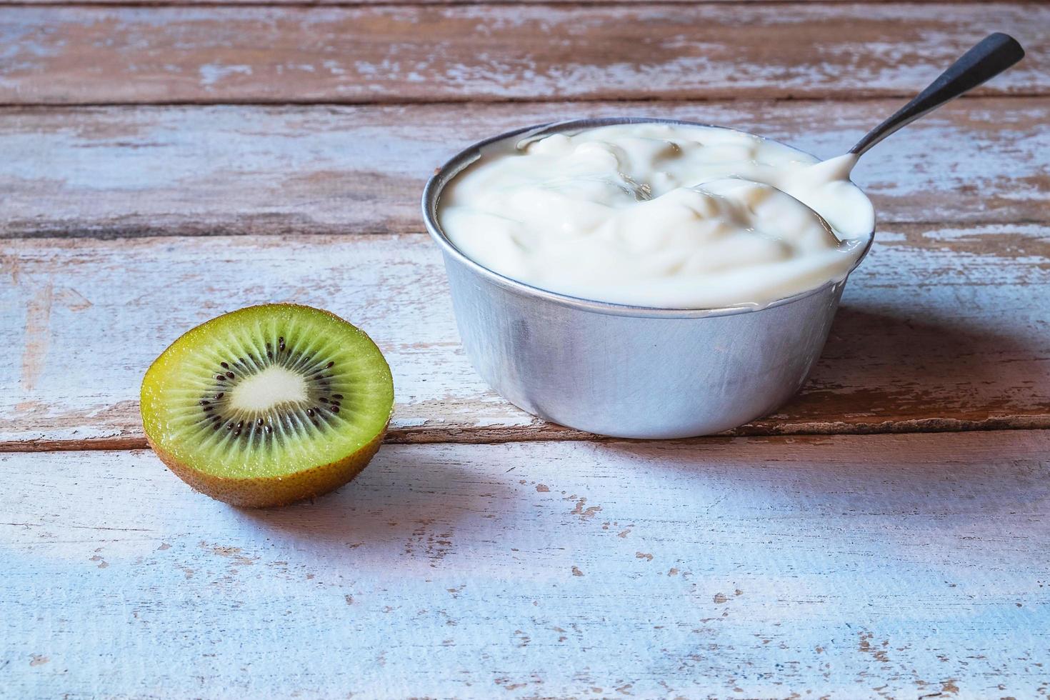 Yogurt and halved kiwi photo