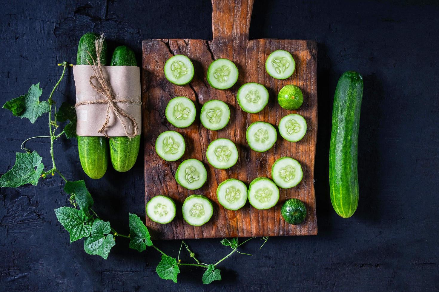 Cucumber slices on a cutting board photo