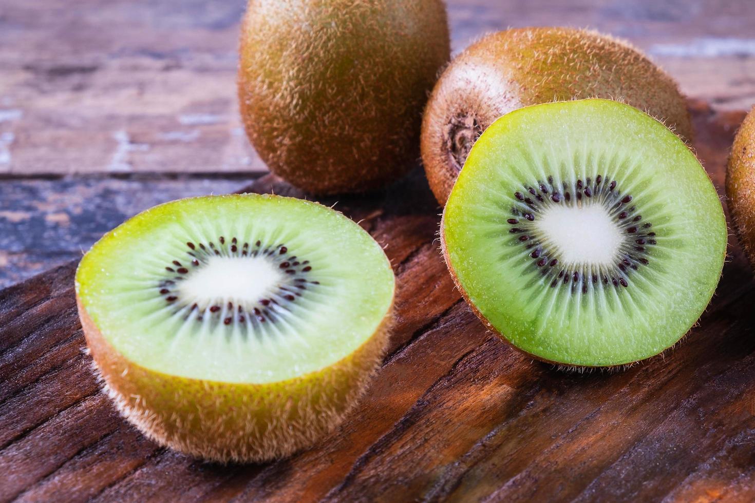 Fresh kiwifruit cut in half photo