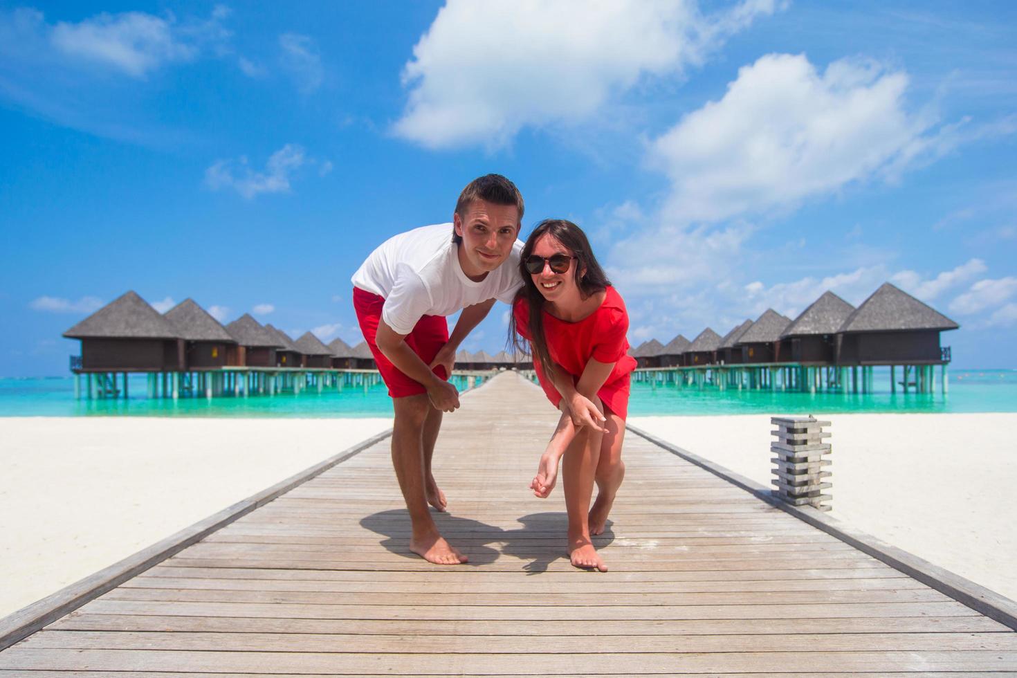 Maldives, South Asia, 2020 - Couple at a beach resort photo