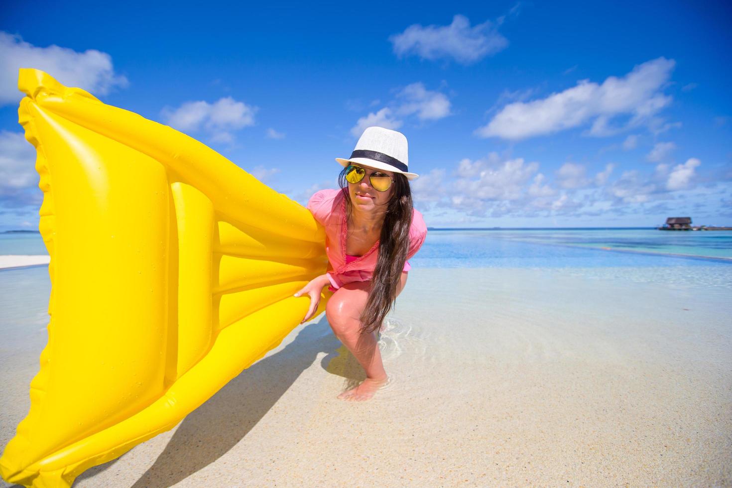 Woman holding a floatie photo