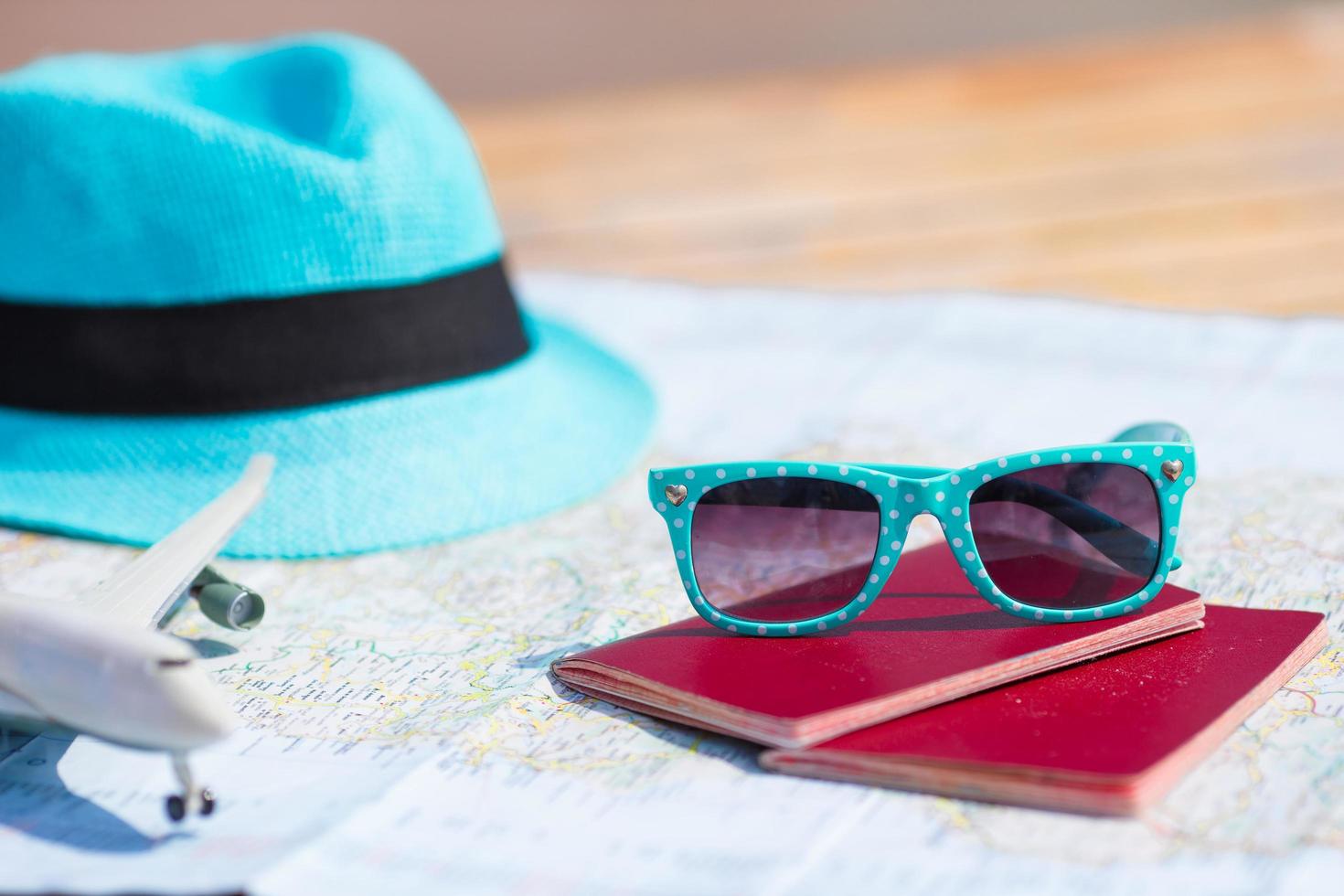 Passports with a hat and sunglasses photo