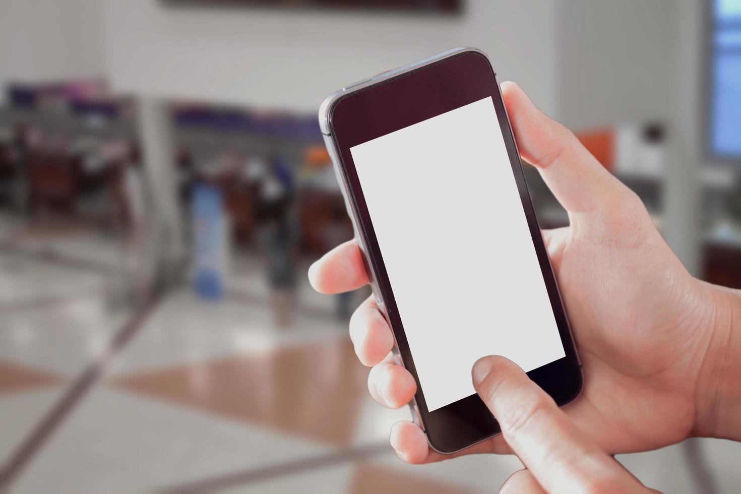 Smartphone mock-up in a gym photo