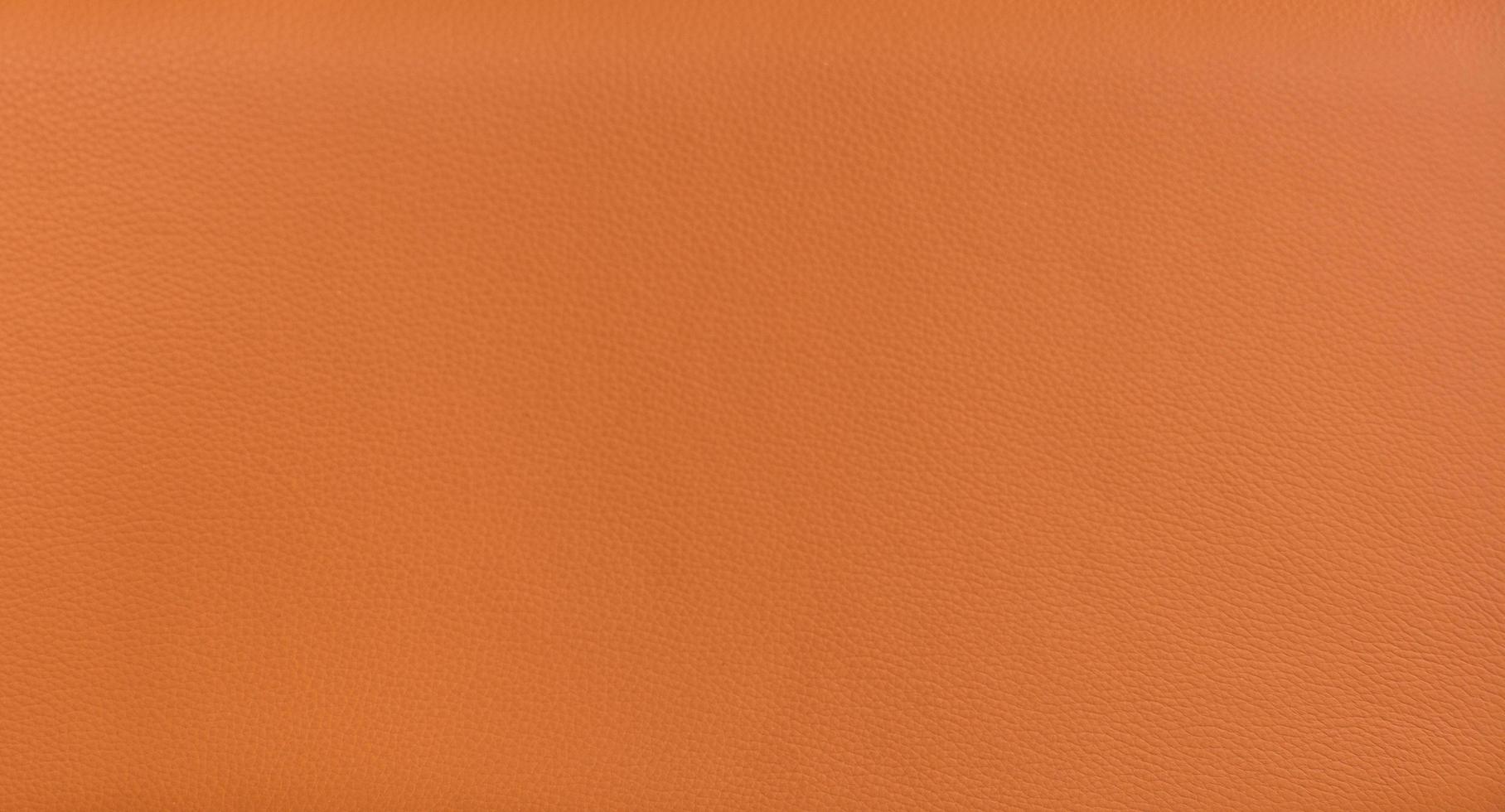 Orange leather texture or background photo