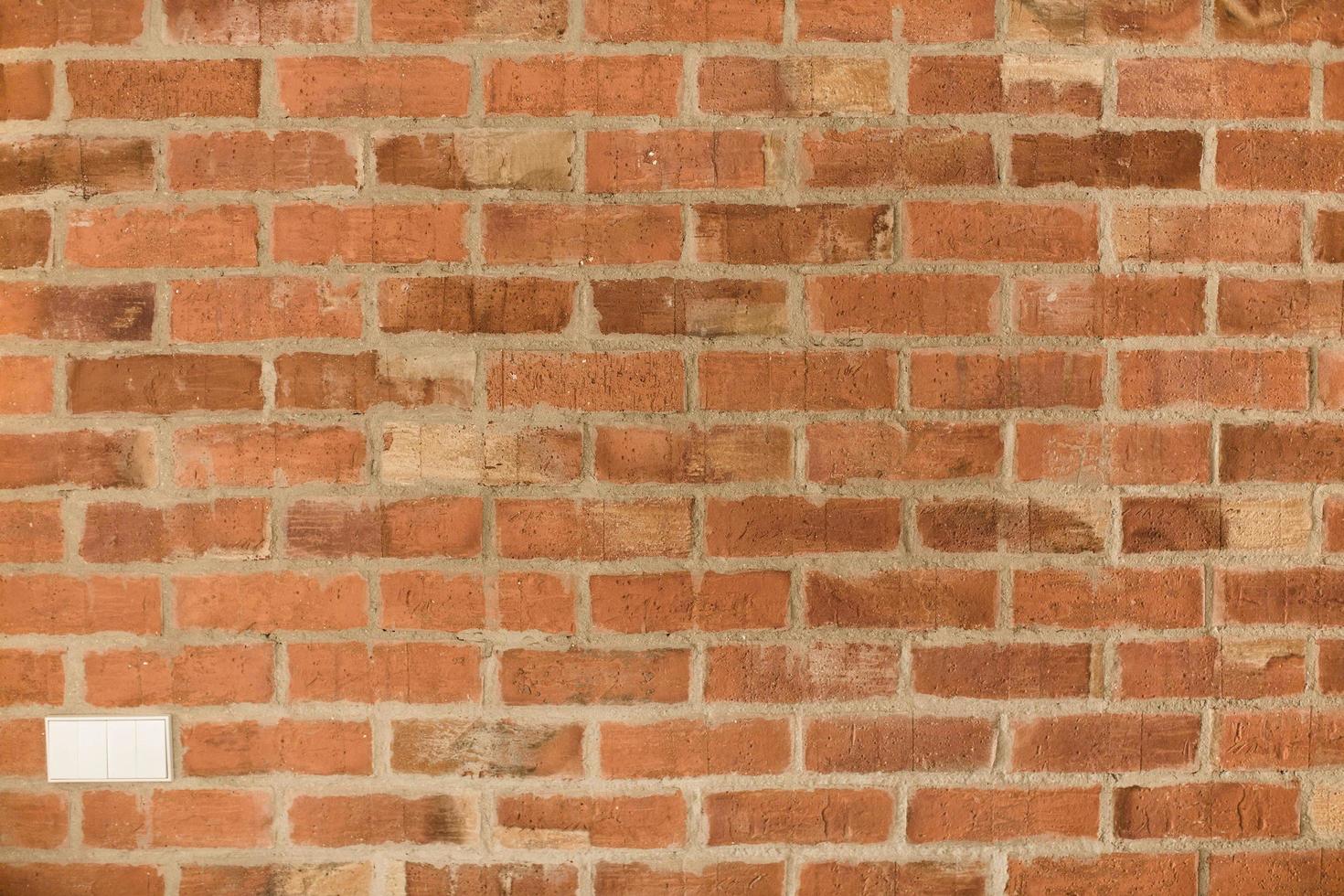 Orange brick wall texture or background photo