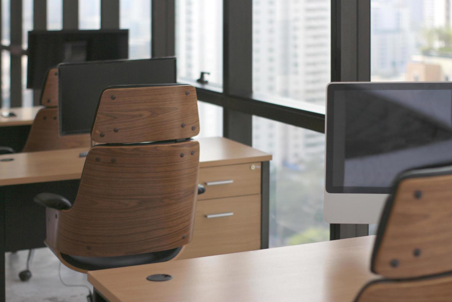 Wooden office tables and desks photo