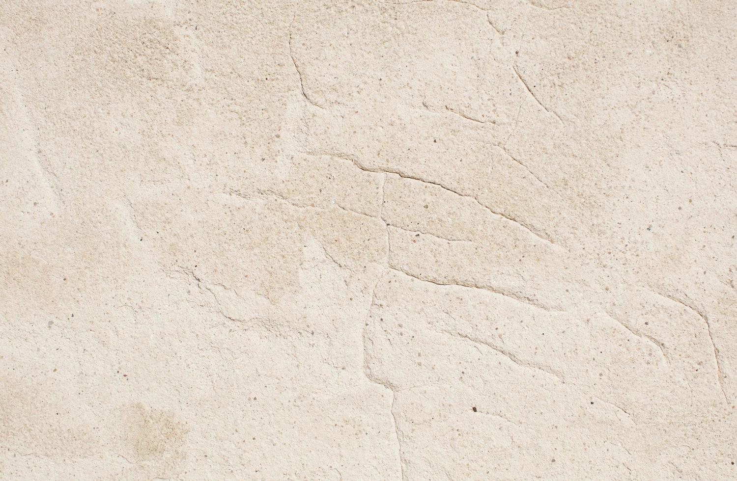 fondo de textura de piedra beige foto