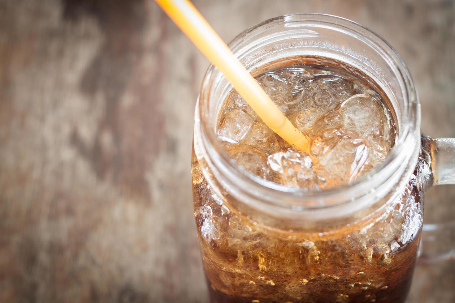 Close-up of a glass of cola photo