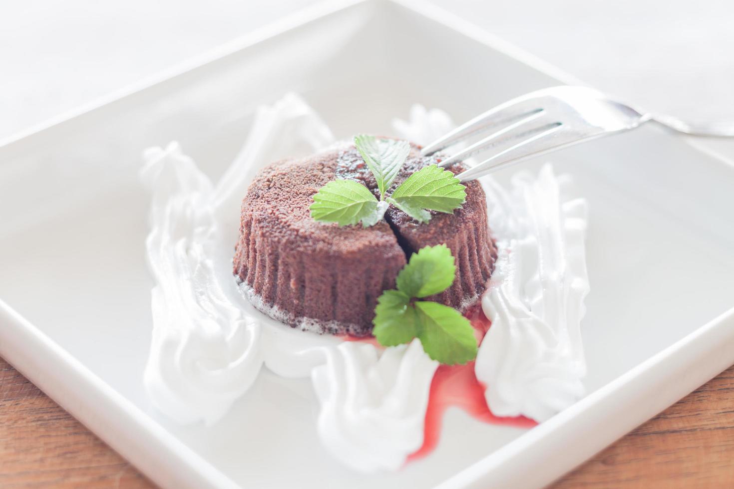 Chocolate lava cake on a white plate photo
