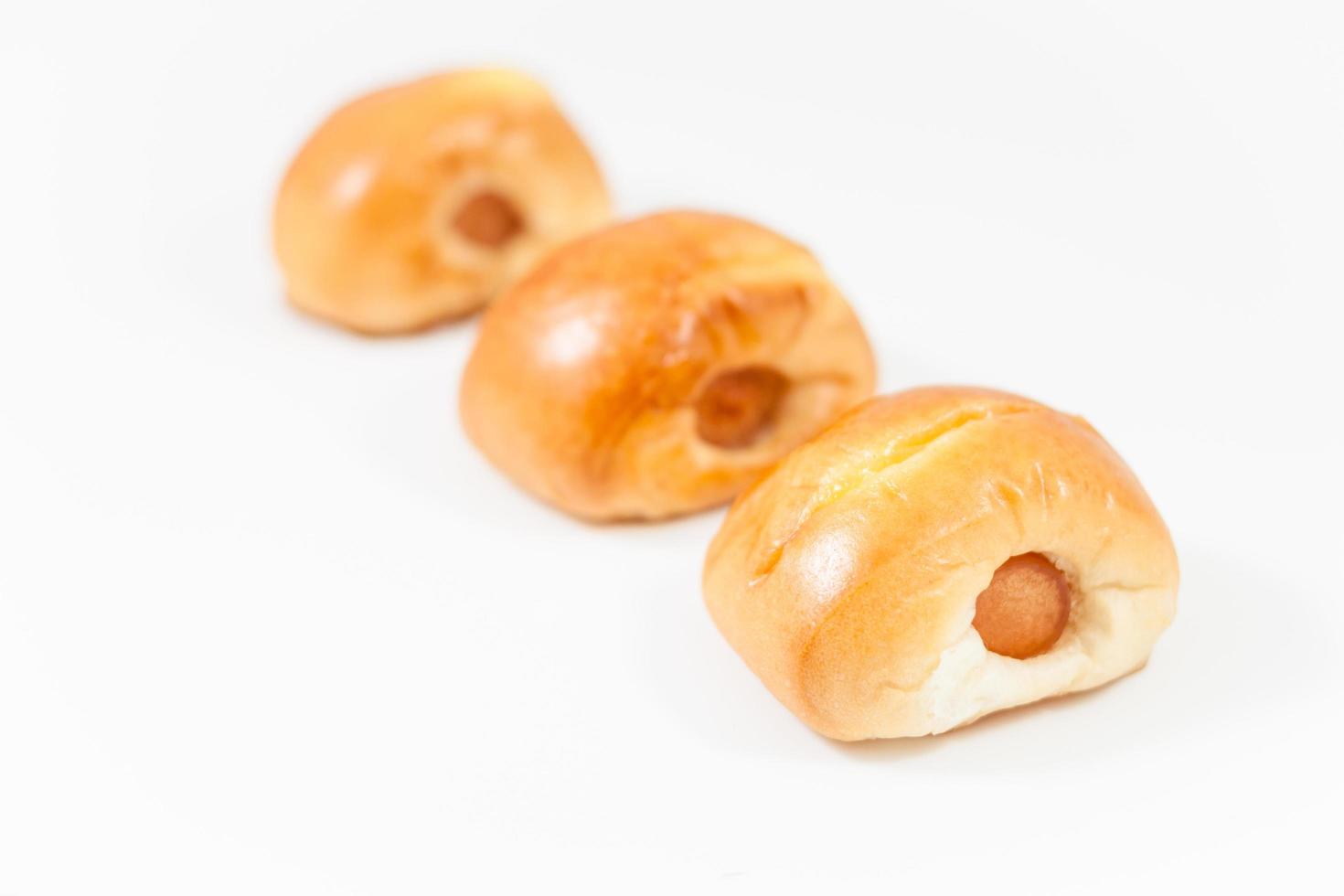 Close-up of sausages in dough photo