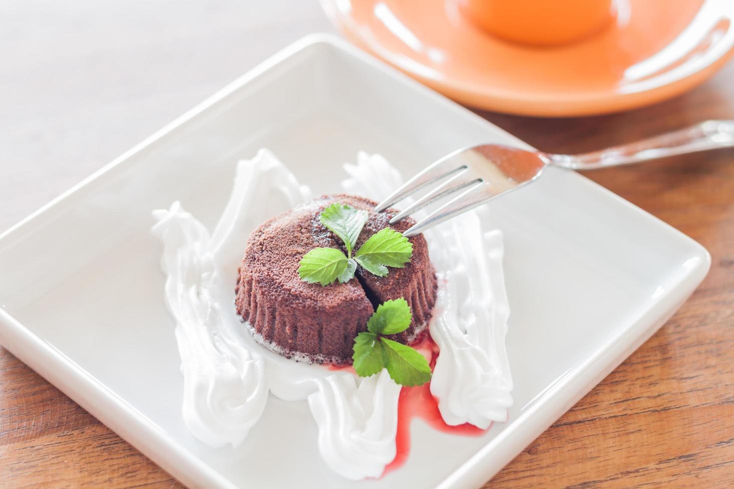 Chocolate lava cake on a white plate photo