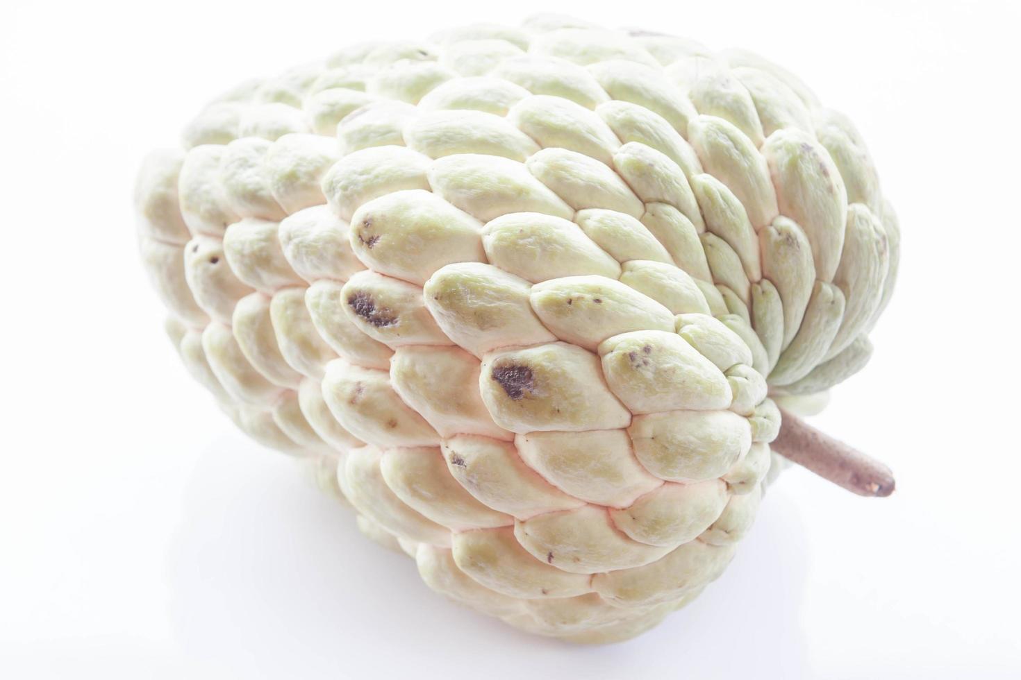 One custard apple on a white background photo