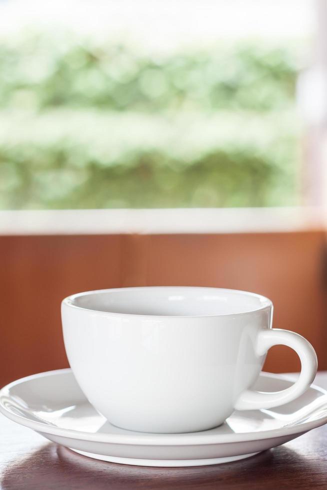 Close-up of a cup of coffee at a coffee shop photo