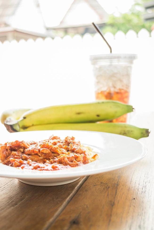 Spaghetti with fruit and a drink photo