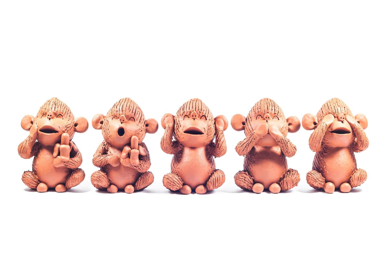 Close-up of clay monkeys photo