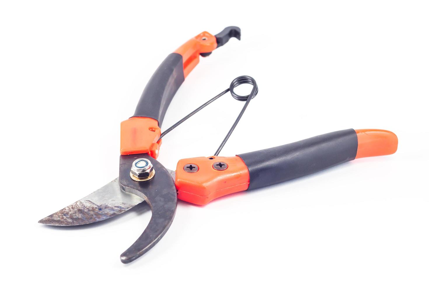 Open pruning shears on white background photo