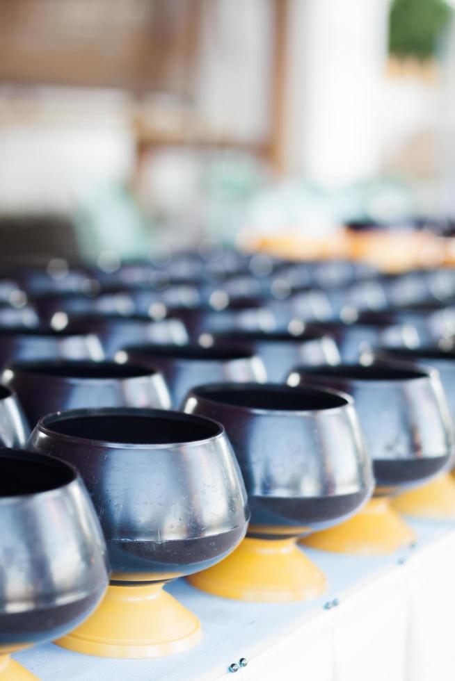 Alms bowls in a temple photo