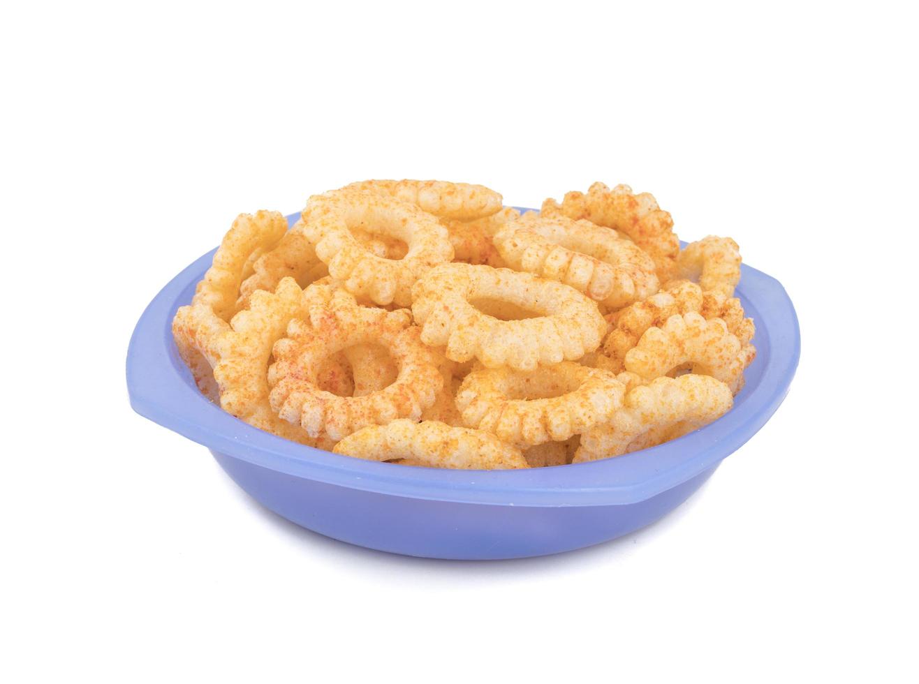 Round ring snacks in a blue bowl photo