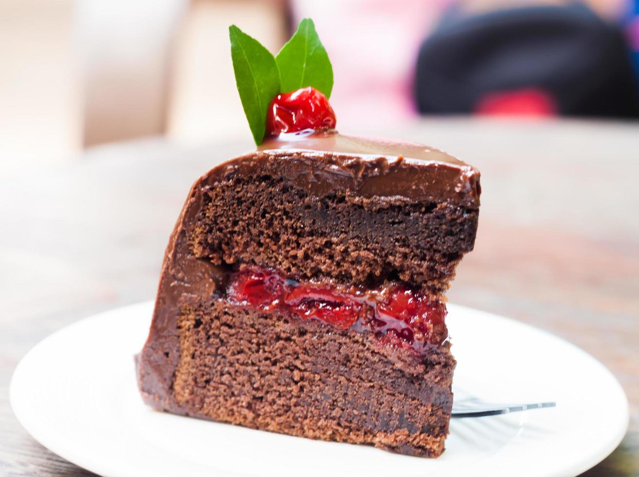 Close-up of chocolate and cherry cake photo