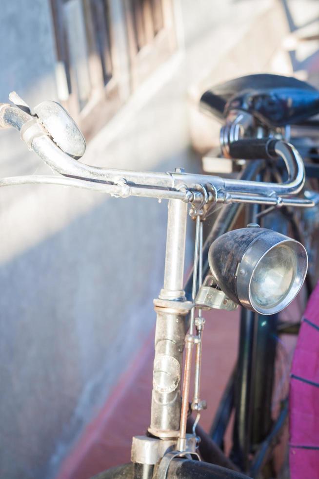 Vintage bicycle near a wall photo