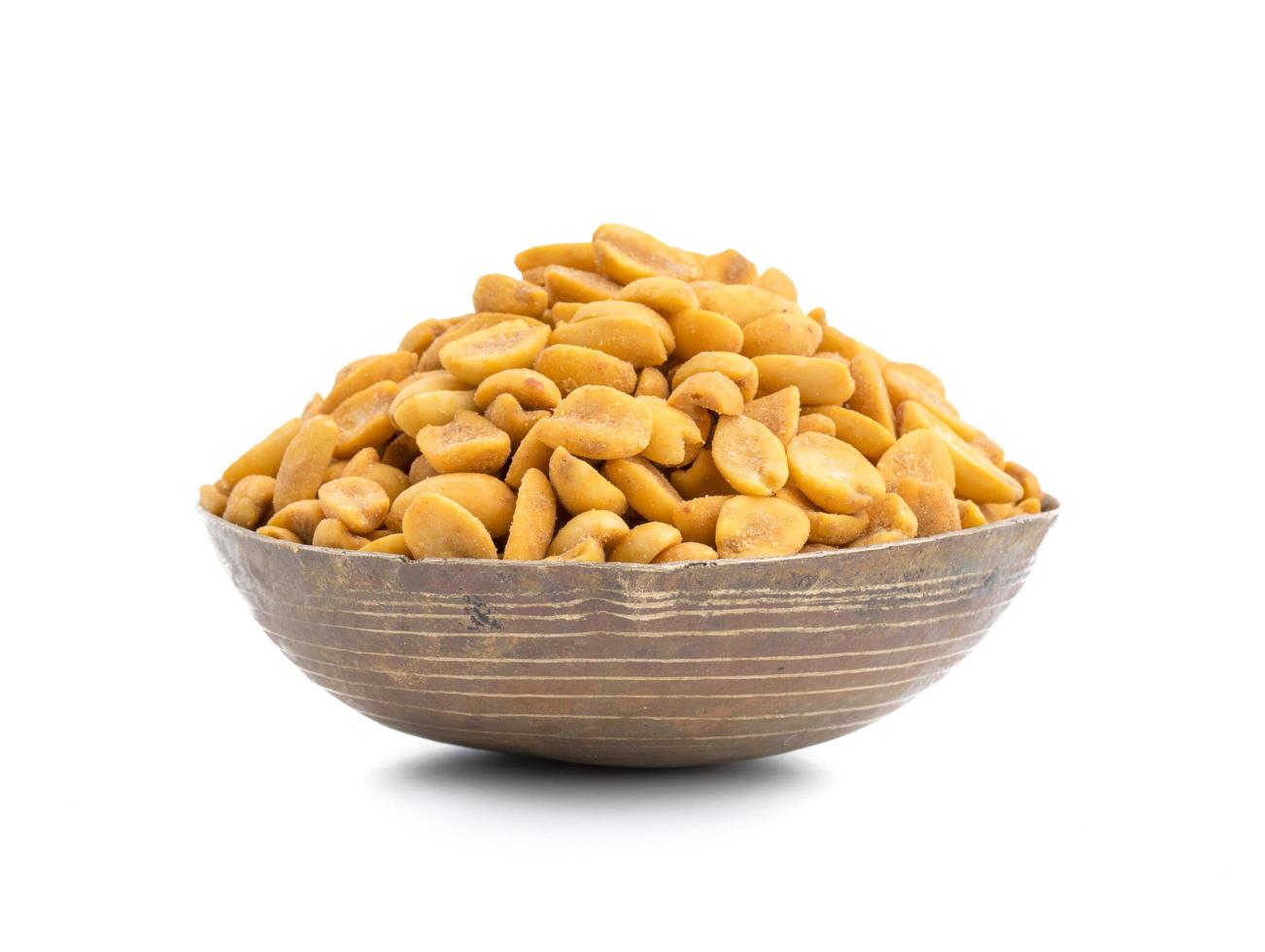 Wooden bowl of masala peanuts photo
