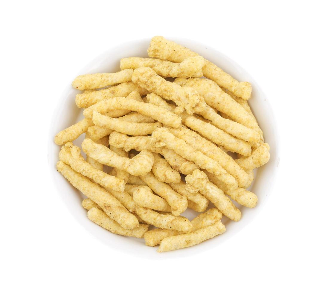 Spicy kurkure on a white background photo