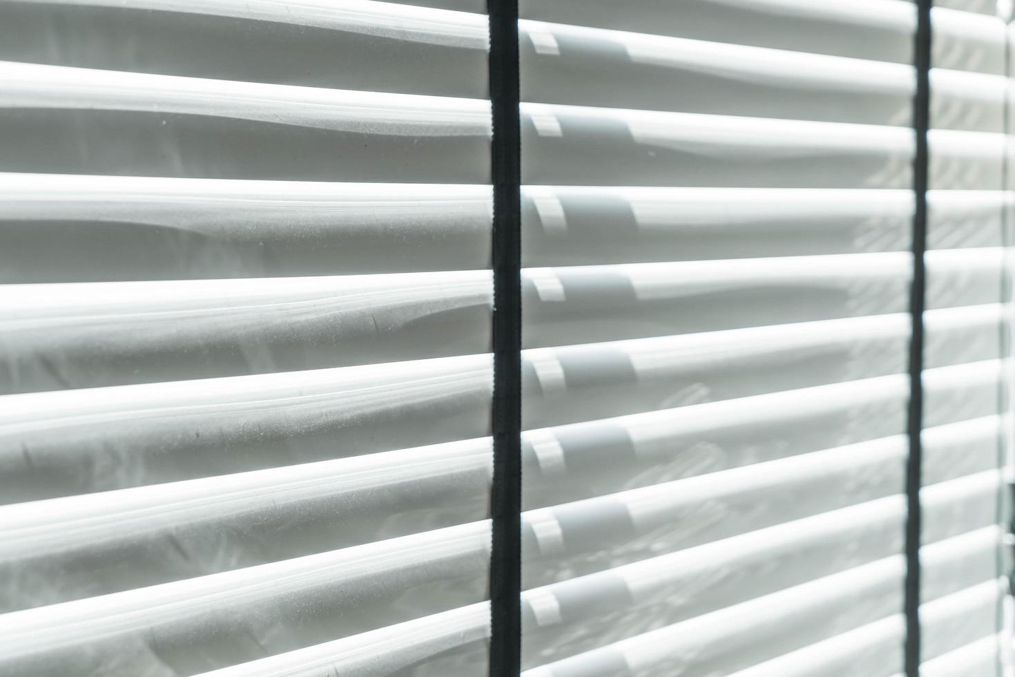 Selective focus point on window blinds photo