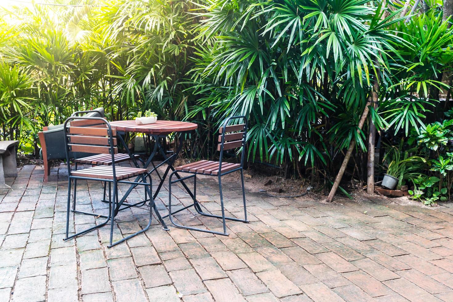 Empty wooden chairs and tables photo