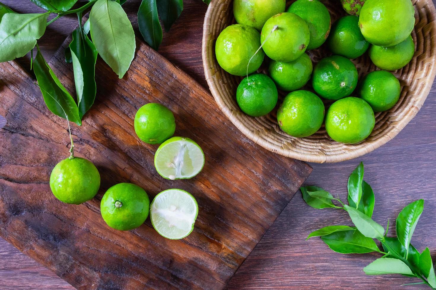 Fresh lime in green basket photo