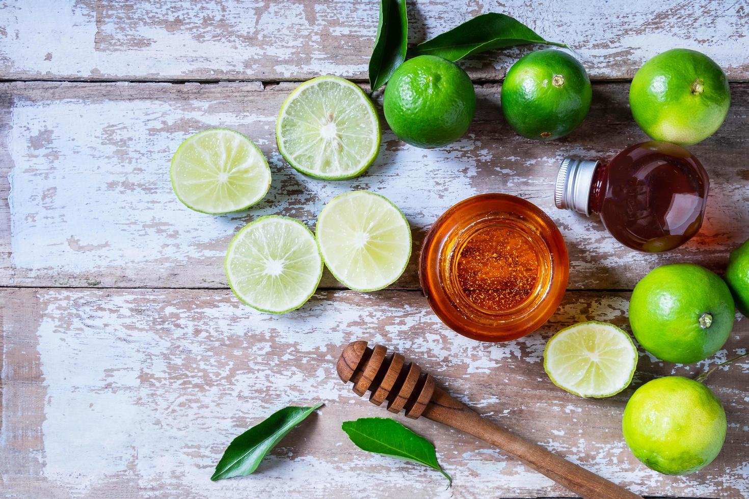 Flatlay of lime and honey photo