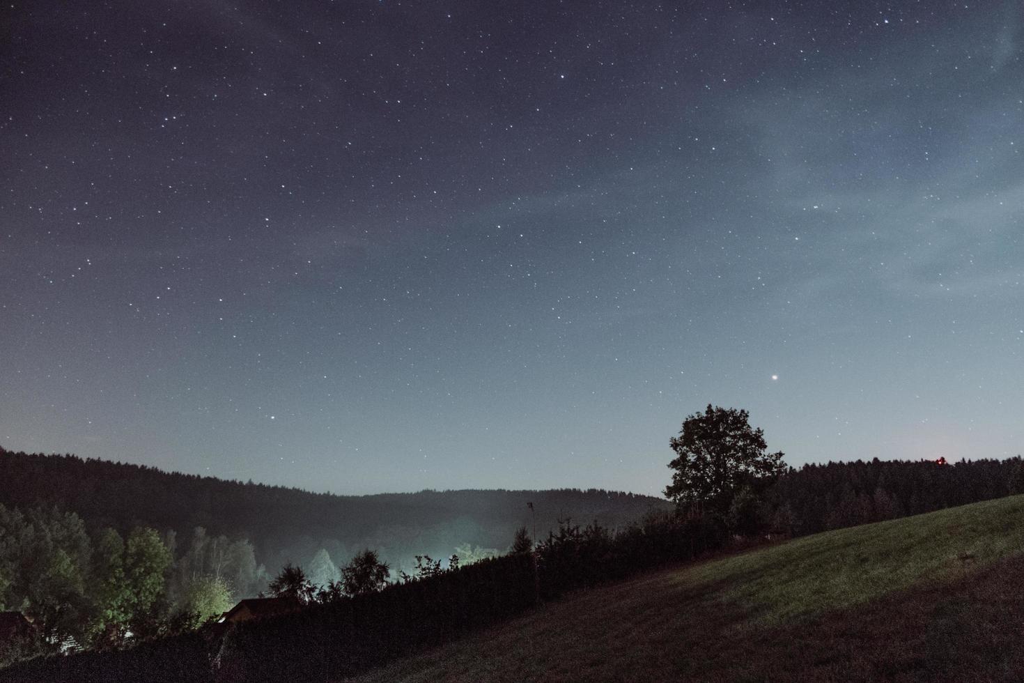 Starry sky over the hills photo