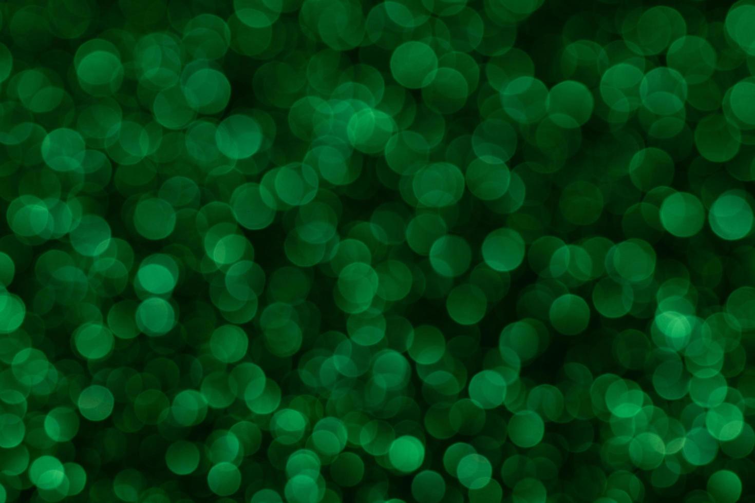 Blurred shiny black and green background photo