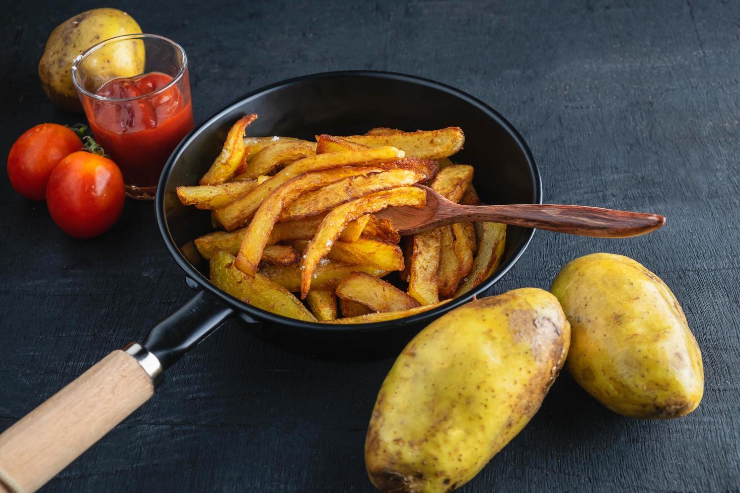Cook fried potatoes photo