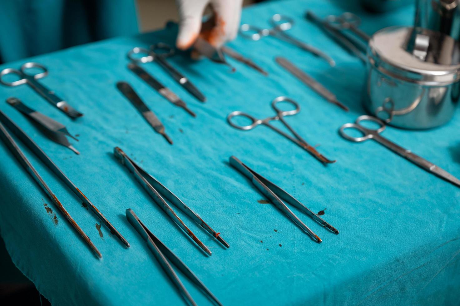 Surgical instruments on a table in operating room photo