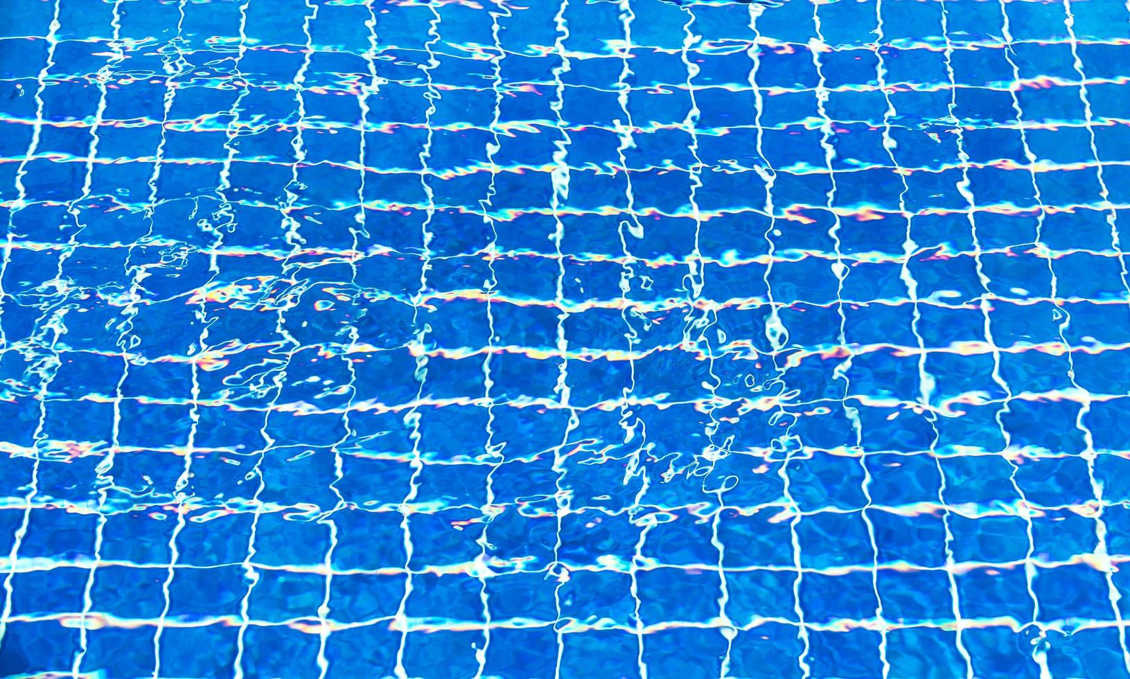 Ripped water in swimming pool photo