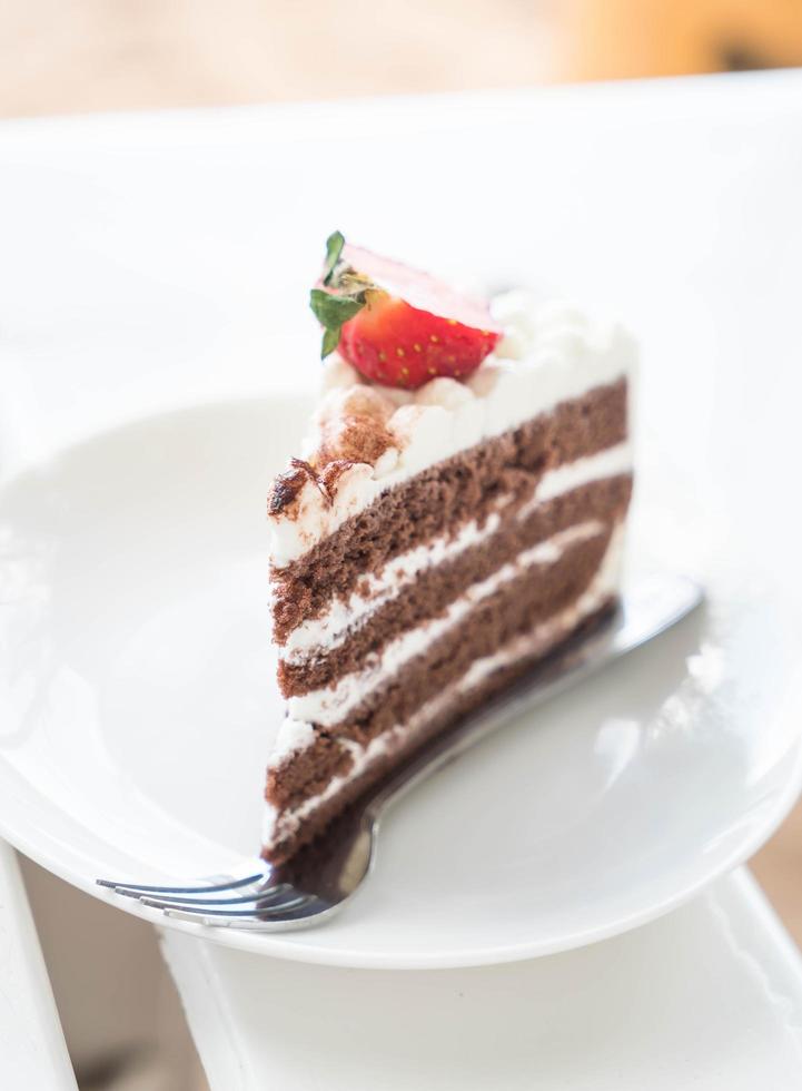 Vanilla and chocolate cake with strawberry photo